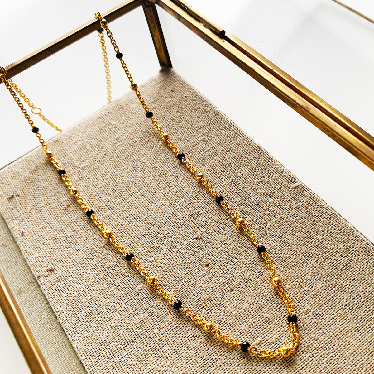 A gold mangalsutra chain necklace