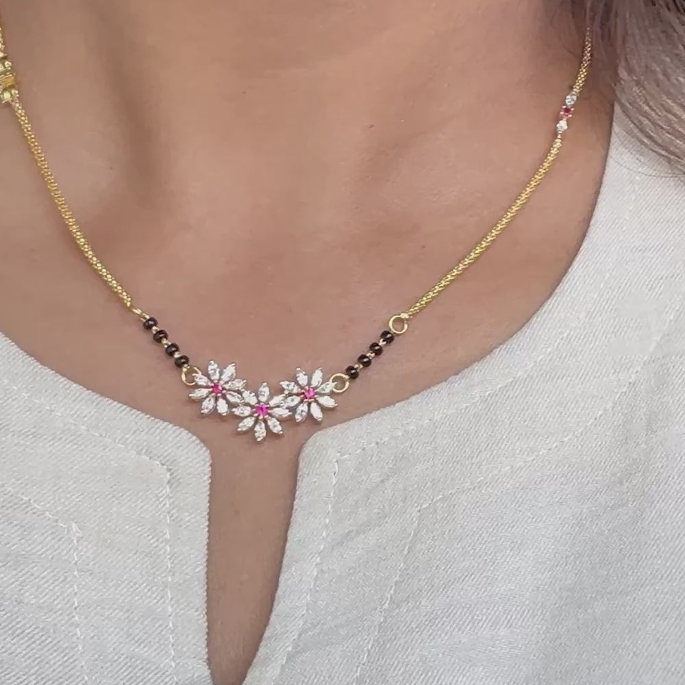 Diamond mangalsutra with ruby in flower design 